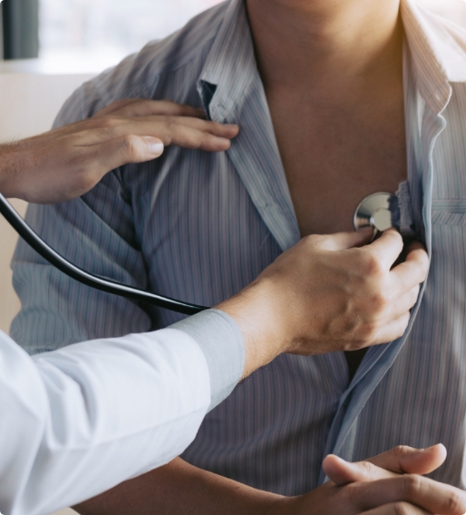 doctor checking man with stethoscope